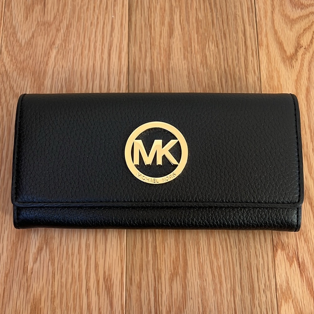 Michael Kors Black flap continental leather Wallet.